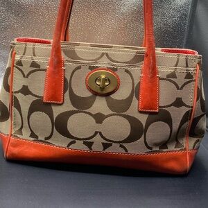 646 Coach #11557 Orange leather w signature canvas HAMPTON MADELINE”